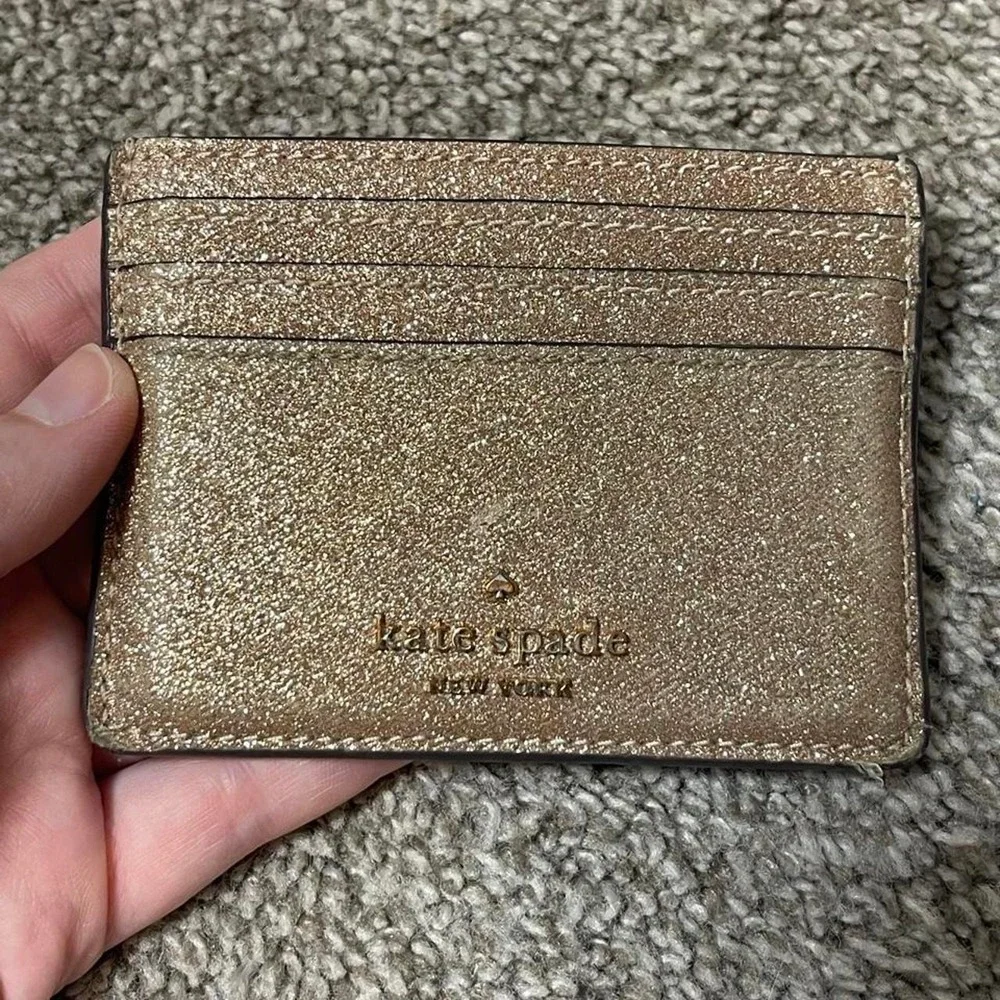 Kate Spade New York gold glitter card holder